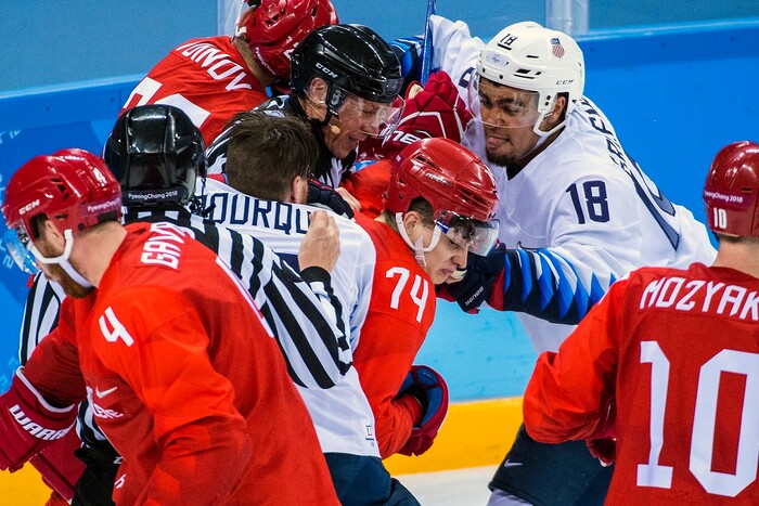 (Chris Detrick  |  The Salt Lake Tribune)  United States forward Jordan Greenway (18) Olympic Athlete from Russia forward Nikolai Prokhorkin (74) Olympic Athlete from Russia defenseman Vyacheslav Voinov (26) and United States forward Chris Bourque (17) fight during the United States vs Olympic Athletes from Russia hockey game at Gangneung Hockey Centre during the Pyeongchang 2018 Winter Olympics Saturday, Feb. 17, 2018. Olympic Athletes from Russia defeated United States 4-0.