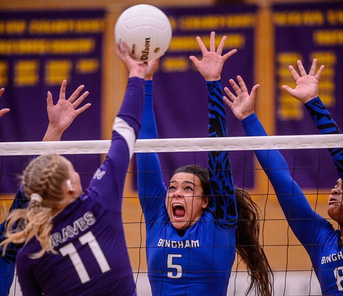 (Trent Nelson  |  The Salt Lake Tribune)  North Summit's Brecklyn Murdock (11) hits the ball over Bingham's Talia Myers (5) as North Summit hosts Bingham, high school girls' volleyball in Coalville, Thursday August 17, 2017.