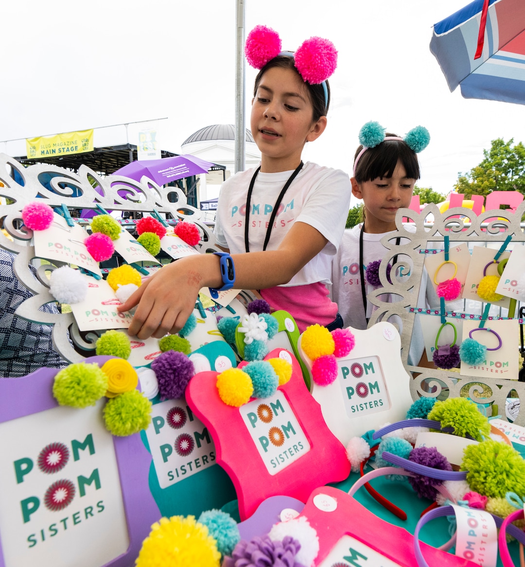 (Rick Egan | The Salt Lake Tribune) The Pom Pom sisters, Syrri and Ari Bateman, see Pom Pom's at 14th annual Craft Lake City DIY FEST, at the Fair Park, Aug. 13, 2022. 
