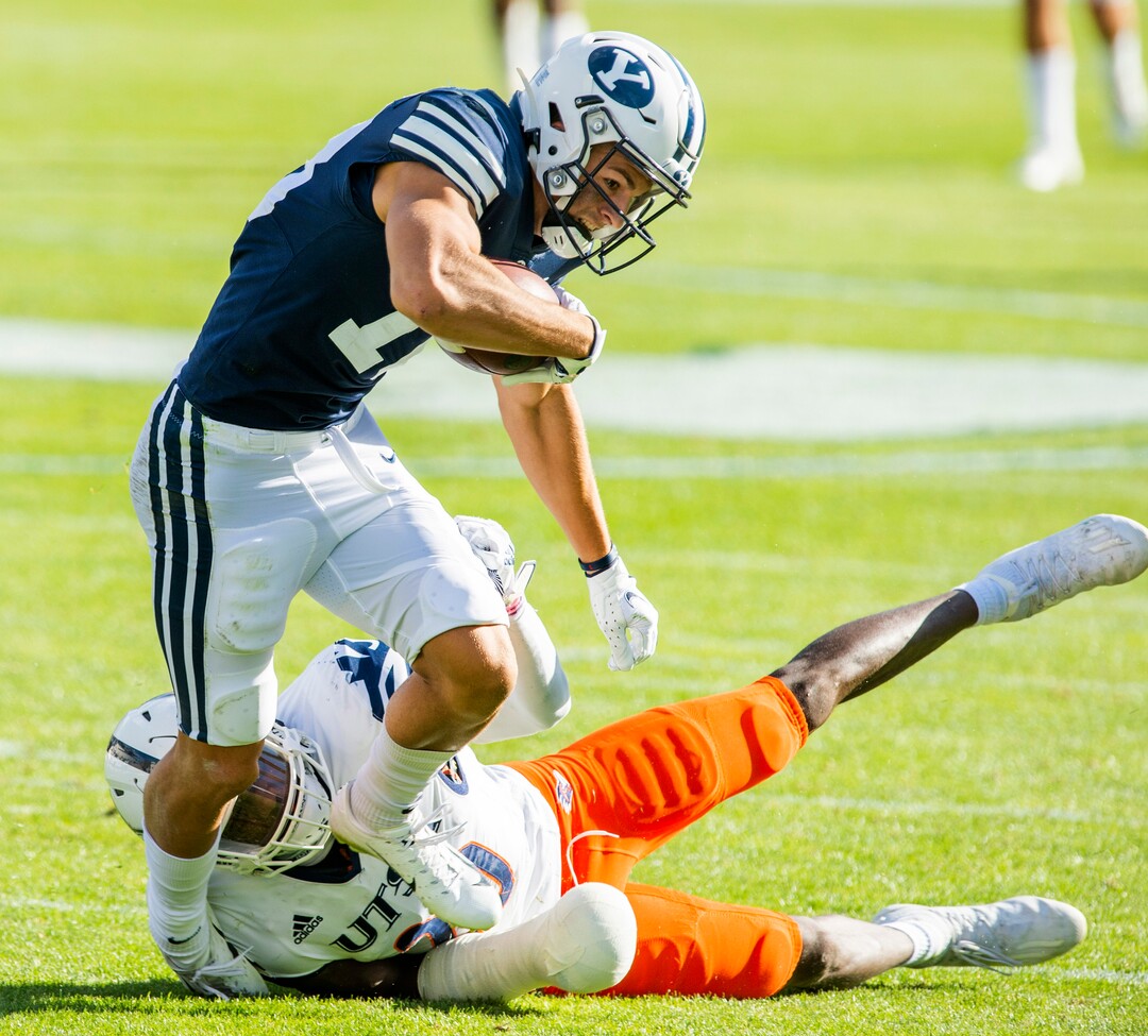 (Rick Egan  |  The Salt Lake Tribune)    Brigham Young Cougars wide receiver Gunner Romney (18) stretches for extra yards after catching along pass, in football action between the Brigham Young Cougars and the UTSA Roadrunners, at Lavell Edwards stadium, Saturday, Oct. 10, 2020.