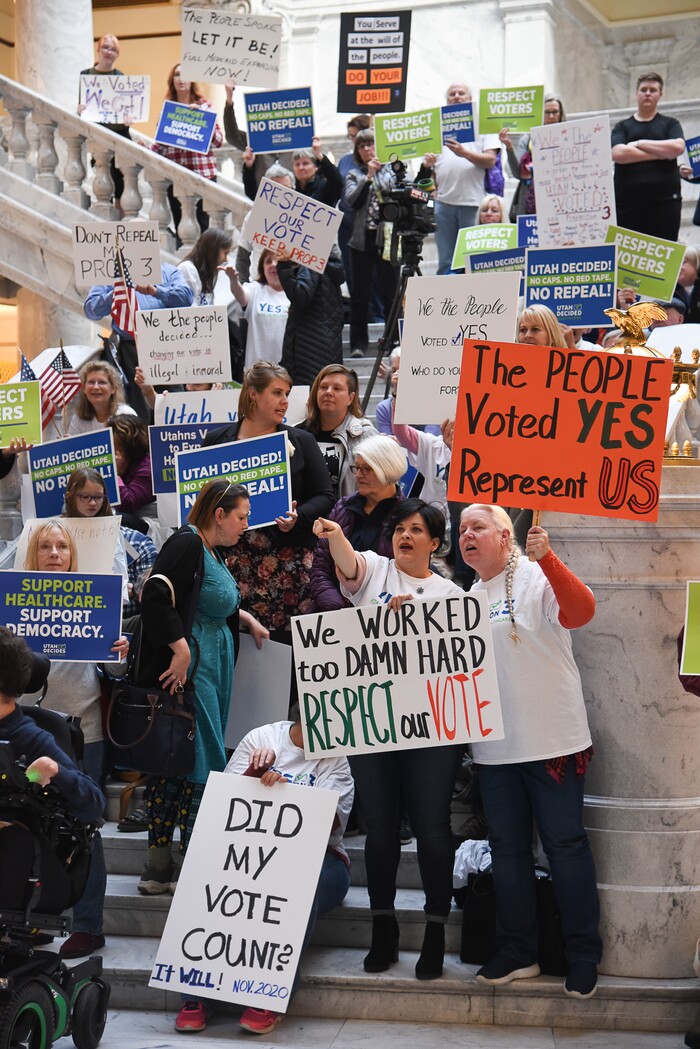 (Francisco Kjolseth  |  The Salt Lake Tribune)  Over 300 demonstrators fill the Capitol rotunda on Monday, Jan, 28, 2019, on the first day of the Legislative session to rally in support of protecting Proposition 3, the Medicaid Expansion law recently passed by voters.
