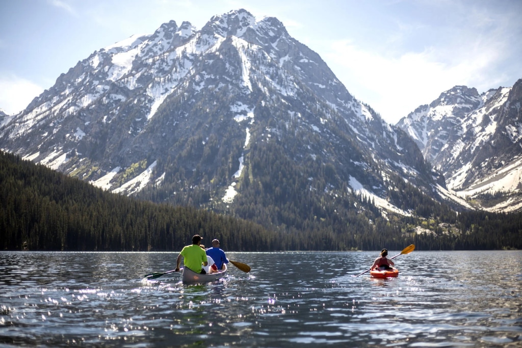 (Ryan Dorgan | Jackson Hole News&Guide)
Anglers paddle their way toward Mount Woodring on the western shore of Leigh Lake in June 2017 in Grand Teton National Park. Former Park Superintendent Samuel T. Woodring’s tumultuous past has sparked an effort to rename the peak.