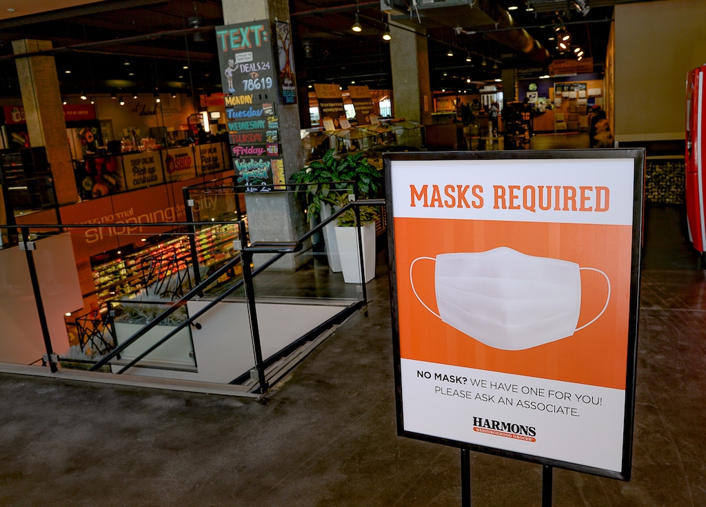 (Francisco Kjolseth  |  Tribune file photo) Shoppers at Harmons Market in downtown Salt Lake City are presented with a sign requiring masks upon entry on Thursday, July 2, 2020, as the coronavirus continues to surge.