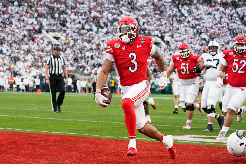 (Marcio Jose Sanchez | AP) Utah running back Ja'Quinden Jackson (3) scores a touchdown during the first half in the Rose Bowl NCAA college football game against Penn State Monday, Jan. 2, 2023, in Pasadena, Calif.