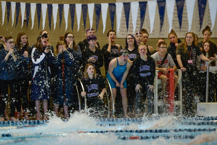 (Francisco Kjolseth  |  The Salt Lake Tribune)  The many faces of encouragement as swimmers are cheered on at the high school swimming 4A State Championships in Bountiful, Friday February 9, 2018.