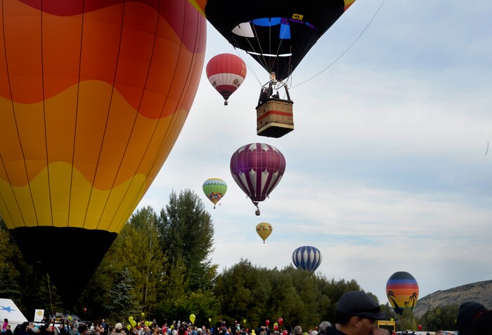 (Scott Sommerdorf | The Salt Lake Tribune)
Balloons launch at the 4th annual Autumn Aloft Hot Air Balloon Festival in Park City, Sunday, September 17, 2017.