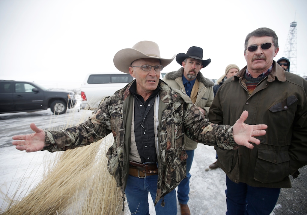 (Rick Bowmer | Associated Press file photo) In this Jan. 9, 2016, file photo, Robert "LaVoy" Finicum, left, a rancher from Arizona, talks to reporters at the Malheur National Wildlife Refuge near Burns, Ore. The family of Finicum, an Arizona rancher fatally shot by Oregon State Police during the armed occupation of a national wildlife refuge, alleged in a federal lawsuit Friday, Jan. 26, 2018, that he was "deliberately executed by a preplanned government ambush." The wrongful-death lawsuit filed in Portland on the second anniversary of Finicum's death seeks at least $5 million in damages for his widow plus each of their 12 children.
