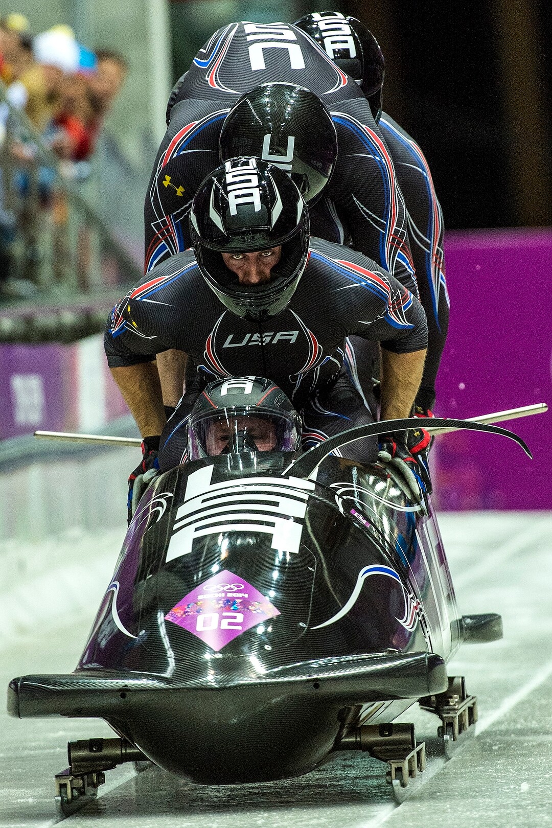 KRASNAYA POLYANA, RUSSIA  - JANUARY 22:Night Train 2, piloted by Steven Holcomb and pushed by Chris Fogt, Curtis Tomasevicz, Steve Langton, compete in the four-man bobsled at Sanki Sliding Center during the 2014 Sochi Olympics Saturday February 22, 2014. After the first run, they are in third place with a time of 54.89. (Photo by Chris Detrick/The Salt Lake Tribune)