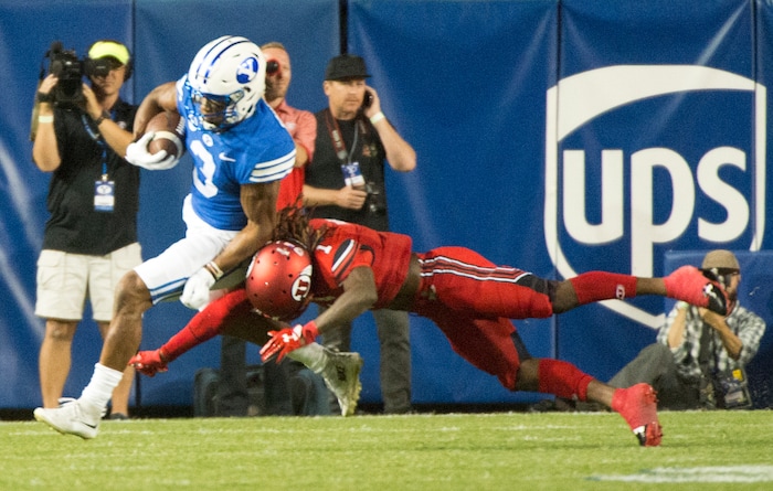 (Rick Egan  |  The Salt Lake Tribune)  Brigham Young wide receiver Jonah Trinnaman (3) runs the ball for the Cougars, in football action BYU vs Utah, at Lavell Edwards Stadium in Provo, Saturday, September 9, 2017.
