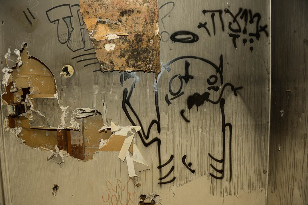 (Trent Nelson | The Salt Lake Tribune)  Graffiti in a dilapidated, fire-damaged building near 100 South 700 East in Salt Lake City, Thursday Feb. 15, 2018. Other Side Academy has received approval to demolish it for their expansion.