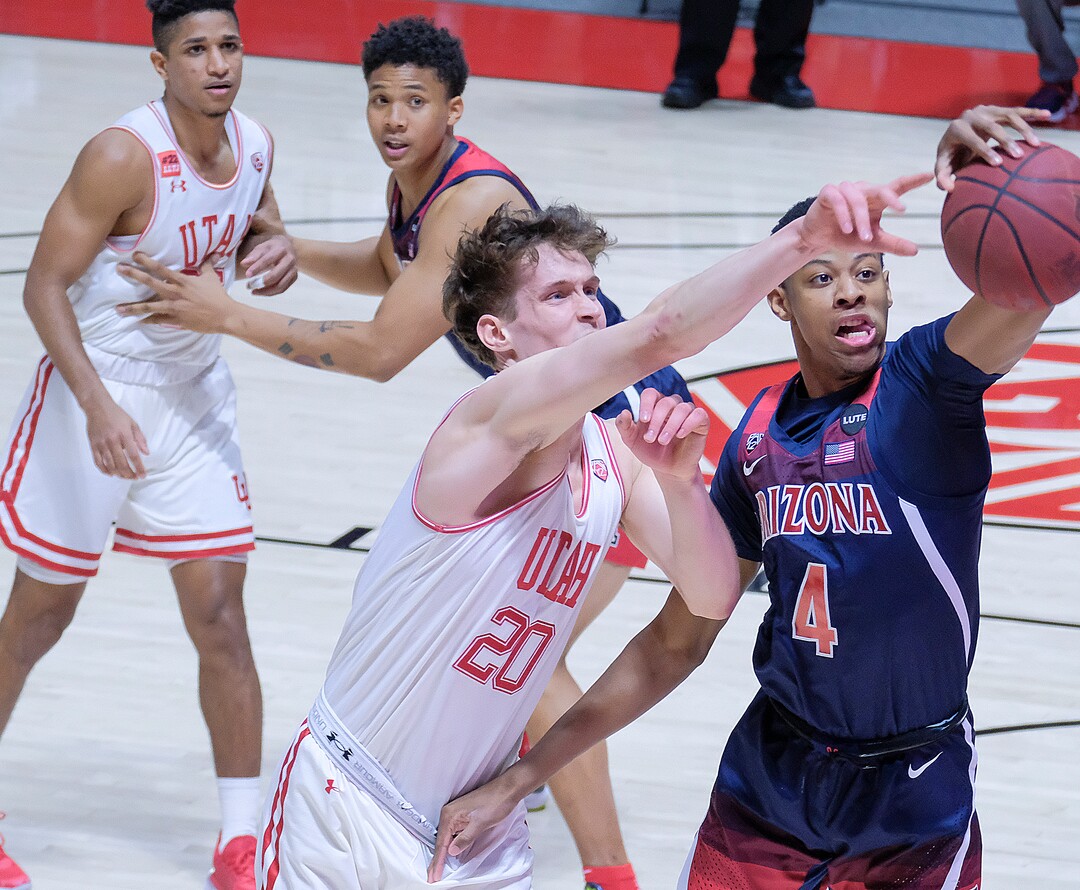 (Leah Hogsten | The Salt Lake Tribune) Utah Utes forward Mikael Jantunen (20) battles Arizona Wildcats guard Dalen Terry (4) for possession as the University of Utah host the Arizona Wildcats, Feb. 4, 2021 at the Jon M. Huntsman Arena.