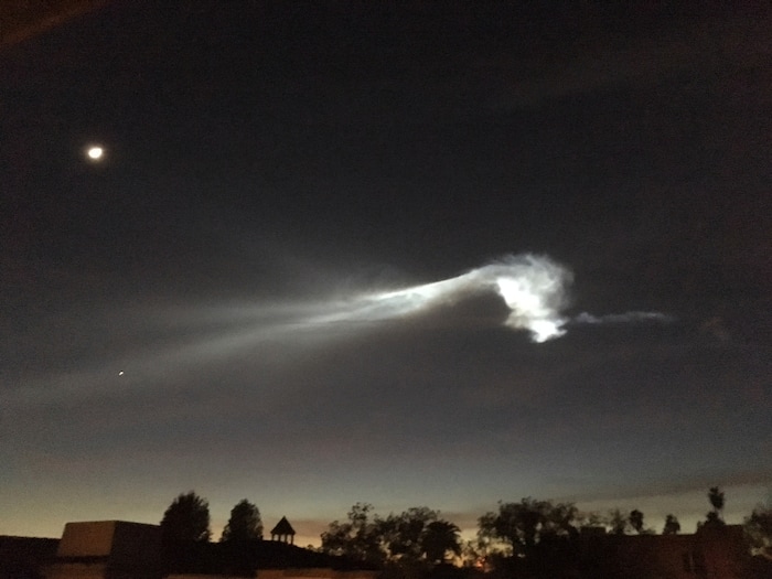 The contrail from a SpaceX Falcon 9 rocket is seen from Pasadena, Calif., about 150 miles east from its launch site in Vandenberg Air Force Base, Calif., on Friday, Dec. 22, 2017. A reused SpaceX rocket has carried 10 satellites into space from California, leaving behind it a trail of mystery and wonder. The Falcon 9 booster lifted off from coastal Vandenberg Air Force Base shortly before 5:30 p.m. Friday. It carried the latest batch of satellites for Iridium Communications. (AP Photo/John Antczak)