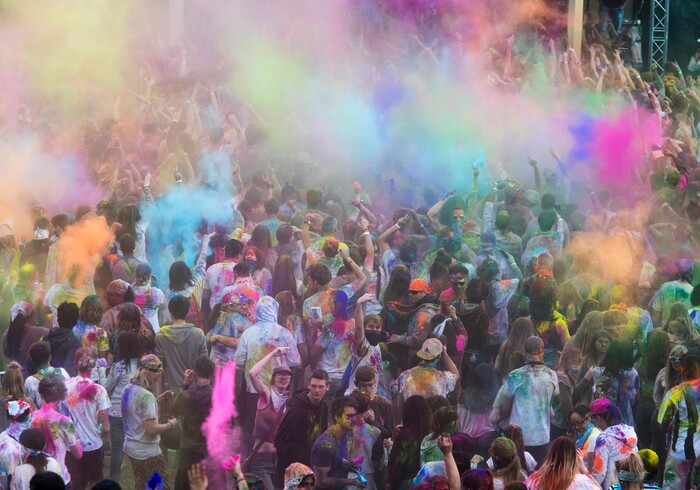(Rick Egan  |  The Salt Lake Tribune)       Revelers dance to the sounds of Luminaries, during the 22nd annual Holi Festival of Colors at the Sri Sri Radha Krishna Temple in Spanish Fork, Saturday, March 24, 2018. 