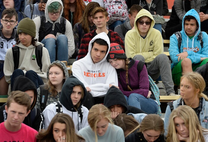 Scott Sommerdorf | The Salt Lake Tribune
Students at Brighton High observe a minute of silence for each sign held up for all of the 17 students and staff killed at Marjory Stoneman Douglas High School, during their walkout at Brighton High School, Wednesday, March 14, 2018.
