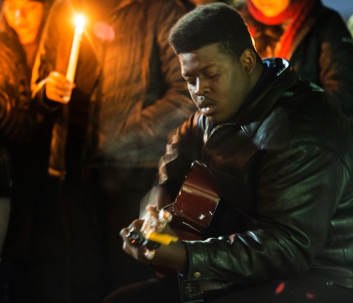 (Rick Egan  |  The Salt Lake Tribune) Nate Byrd, president of the BYU Black Student Union, sings a song during a candlelight vigil on BYU campus, for the student who died by suicide this week, at the Tanner Building, Friday, Dec. 7, 2018.