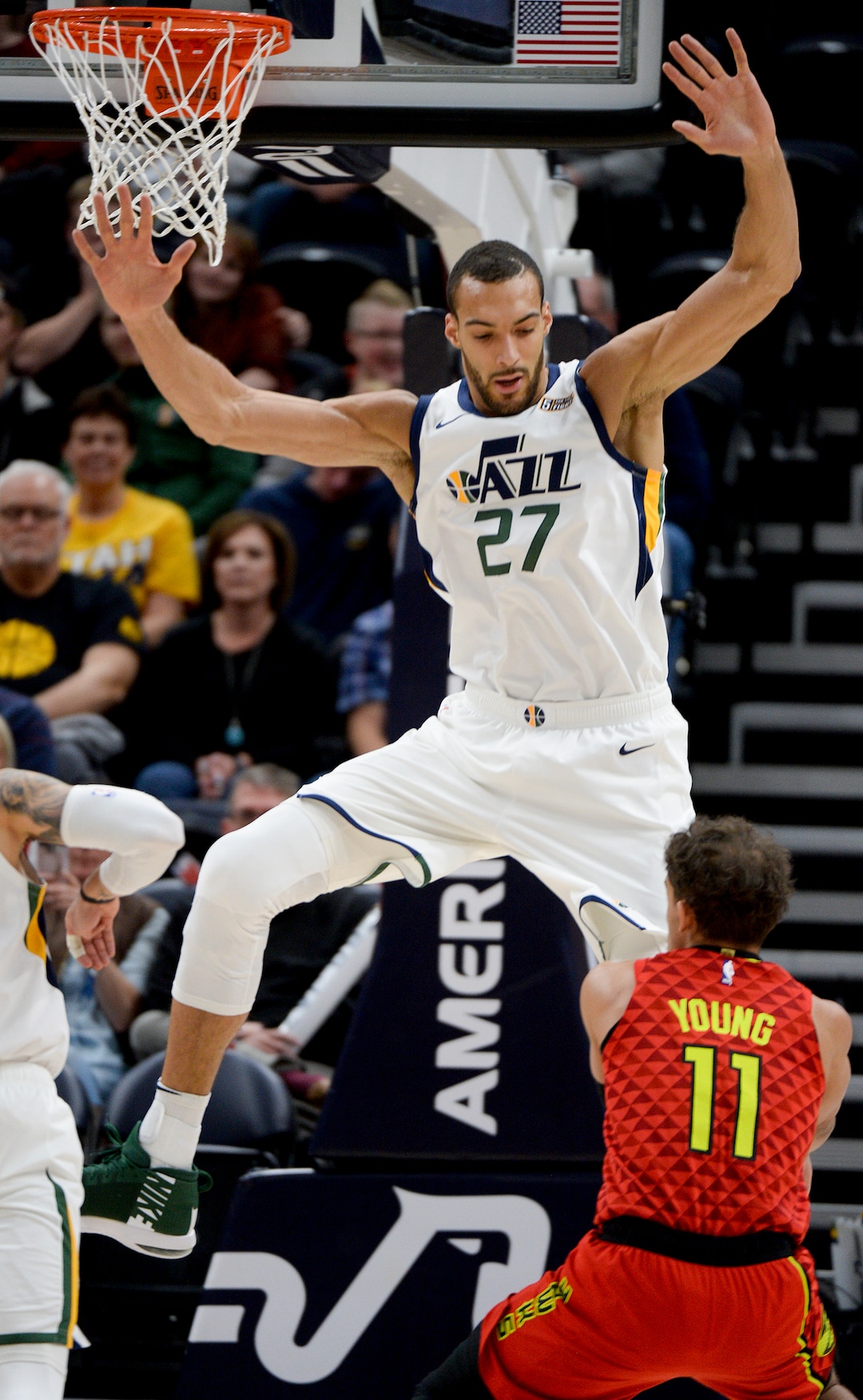 Leah Hogsten  |  The Salt Lake Tribune  Utah Jazz center Rudy Gobert (27) skies above Atlanta Hawks guard Trae Young (11) as the Utah Jazz take on the Atlanta Hawks, Feb. 1, 2019 at Vivint Smart Home Arena. 
