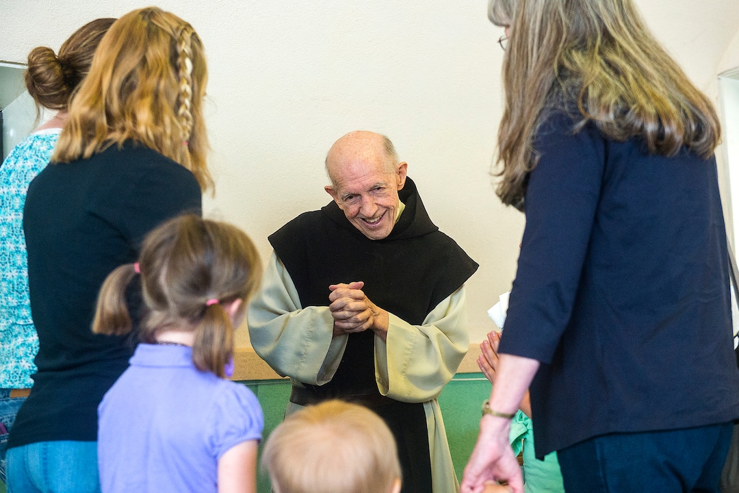 (Chris Detrick  |  The Salt Lake Tribune)  "Father Patrick" Boyle talks with the Vore family, of Farr West, in the bookstore and gift shop at the Abbey of Our Lady of the Holy Trinity in Huntsville on Wednesday, Aug. 23, 2017.