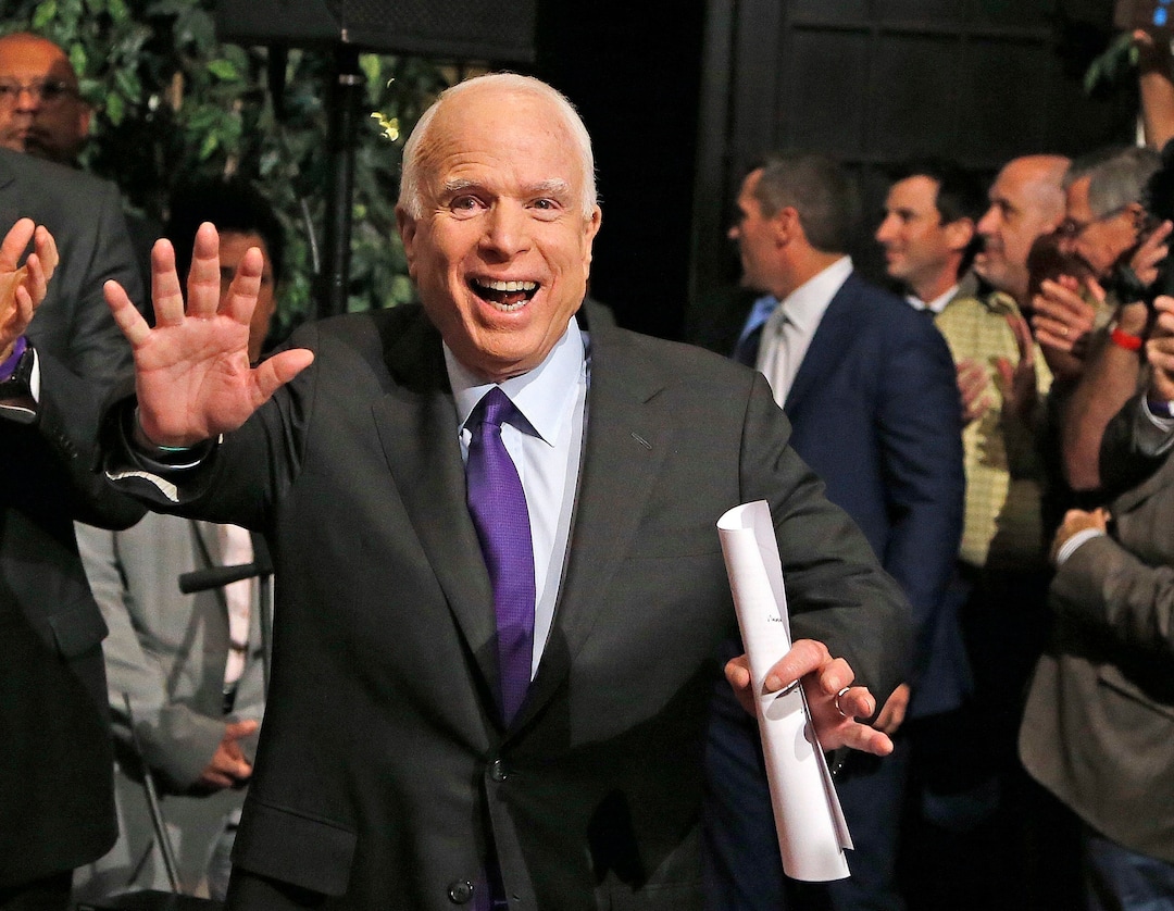 FILE - In this Nov. 8, 2016, file photo, Sen. John McCain, R-Ariz. waves to supporters as he arrives for his victory party prior to officially announcing his victory over Democrat Ann Kirkpatrick in Phoenix. McCain is this year's recipient of the National Constitution Center's Liberty Medal. The six-term Republican senator from Arizona will receive the award Monday, Oct. 16, 2017, at the Philadelphia museum for his "lifetime of sacrifice and service" to the country. (AP Photo/Ross D. Franklin, File)