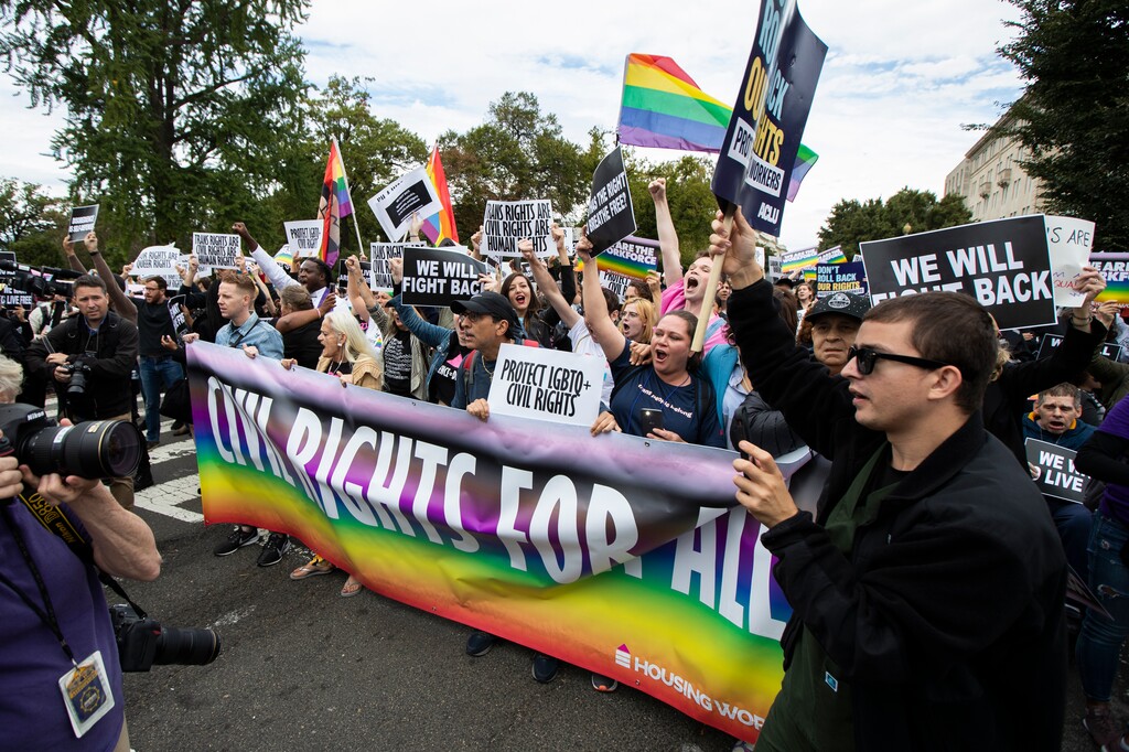 (Manuel Balce Ceneta | AP file photo)  Supporters of LGBTQ rights stage a protest on the street in front of the U.S. Supreme Court, Tuesday, Oct. 8, 2019 in Washington.