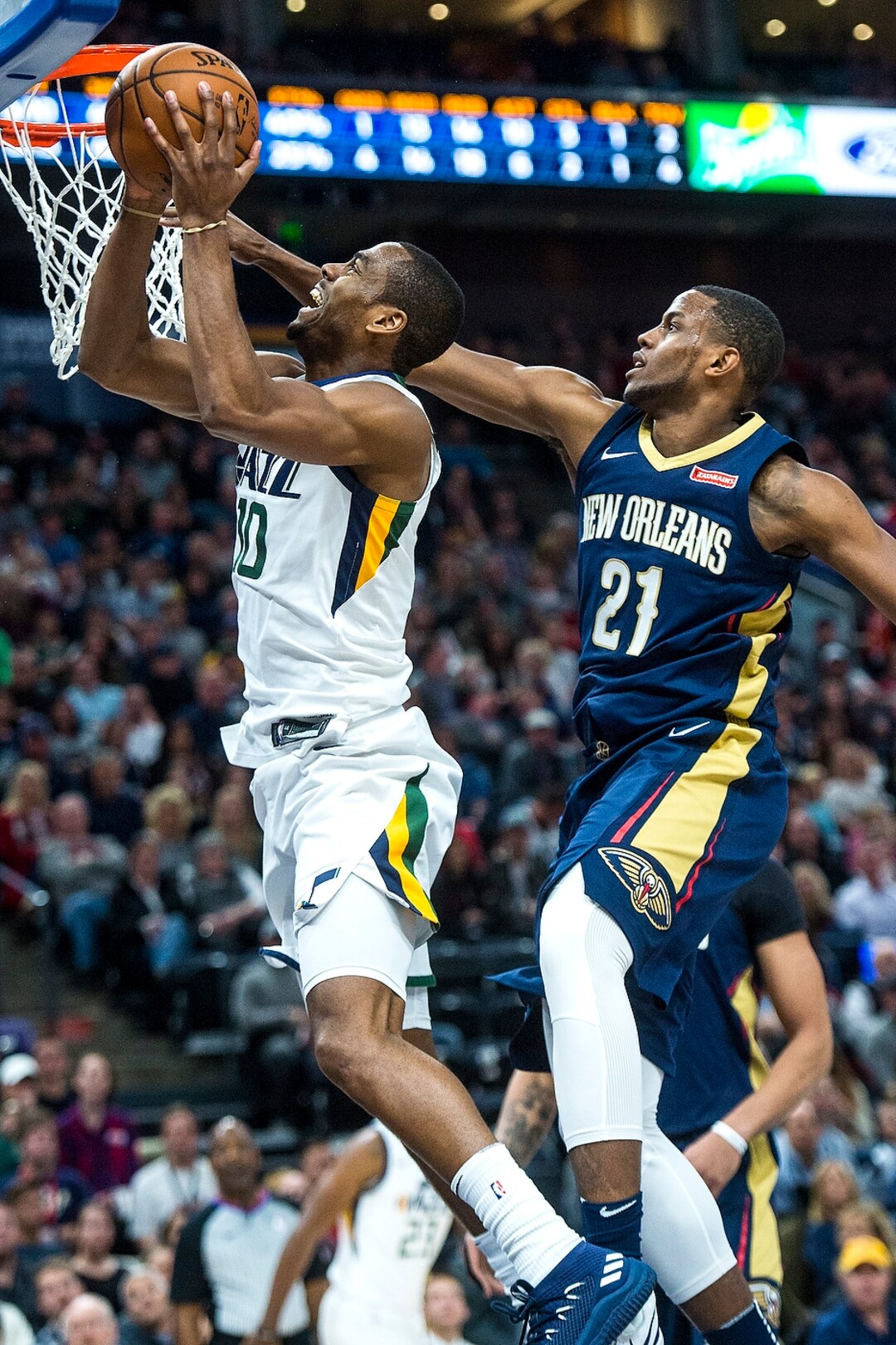 (Chris Detrick  |  The Salt Lake Tribune)  Utah Jazz guard Alec Burks (10) shoots past New Orleans Pelicans forward Darius Miller (21) during the game at Vivint Smart Home Arena Friday, December 1, 2017.  
