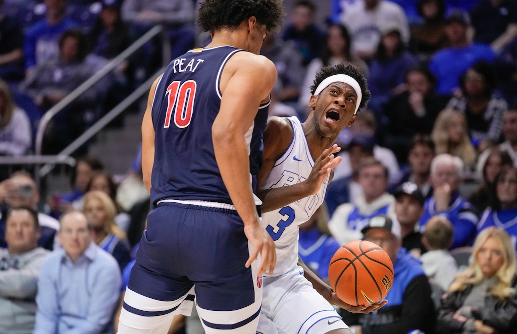 (Francisco Kjolseth | The Salt Lake Tribune) Arizona Wildcats forward Koa Peat (10) pressures BYU Cougars forward AJ Dybantsa (3) as BYU hosts No. 1 Arizona.