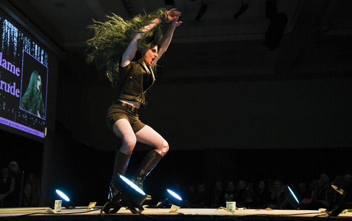 (Francisco Kjolseth  |  The Salt Lake Tribune)  Bryson LaBar, a theater student at Utah State University entertains a large crowd gathered at the Taggart Student Center ballroom as Madame LaCrude recently. USU hosted their first ever drag show recently as ten drag queens and kings put on spirited and creative performances. 