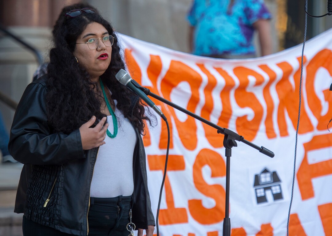 (Rick Egan  |  The Salt Lake Tribune)       Mariella  Mendoza speaks at a rally as Homeless and homeless advocates gather outside the City County building for a demonstration before the city council meeting, Tuesday, April 23, 2019.