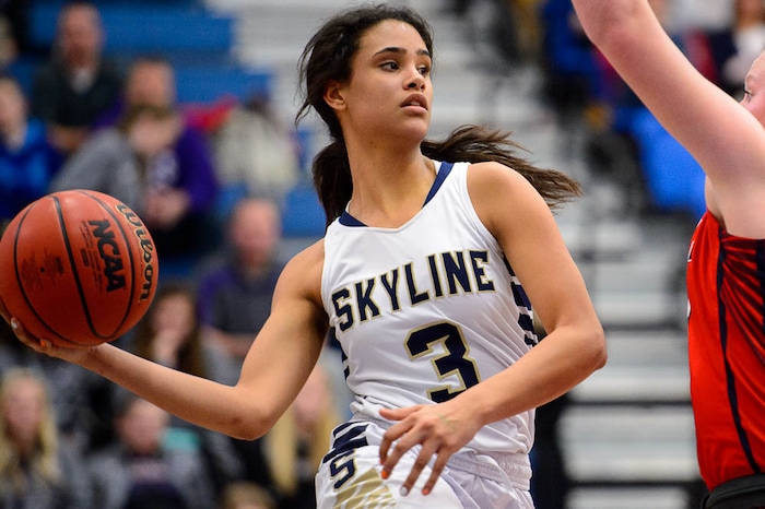 (Trent Nelson | The Salt Lake Tribune)  Skyline's Kiana Eskelson (3) looks to pass around Springville's Addisyn Johnson (33) as Skyline faces Springville in the 5A High School Girls' Basketball Tournament at SLCC in Taylorsville, Wednesday Feb. 21, 2018.