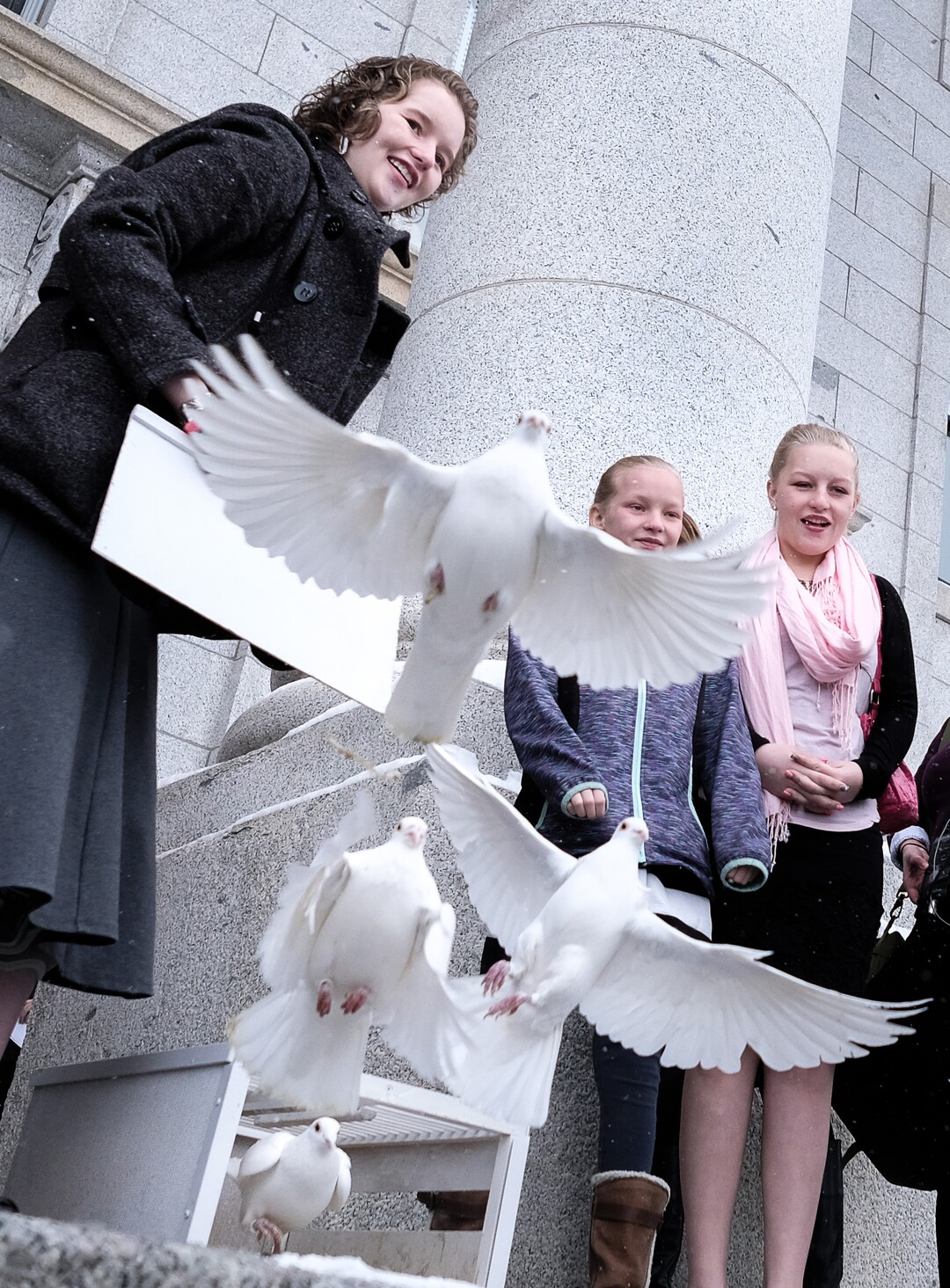 (Francisco Kjolseth  |  The Salt Lake Tribune)  Deserae Turner releases 25 doves on the front steps of the Utah Capitol on Tuesday, Feb. 20, 2018, representing the number of attempts for every suicide death. Turner, a Utah teenage girl who survived being shot in the head by two boys was there to bring attention to bullying and its connection to suicide. 