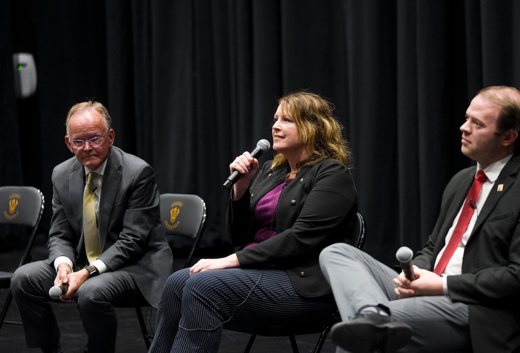 (Bethany Baker | The Salt Lake Tribune) Senate District 7 Republican primary candidate Stephanie Hollist, center, answers questions alongside Senate President J. Stuart Adams, R-Layton, left, and Republican candidate Braden Hess during a Grow the Flow forum in Sunset on Tuesday, June 16, 2026.