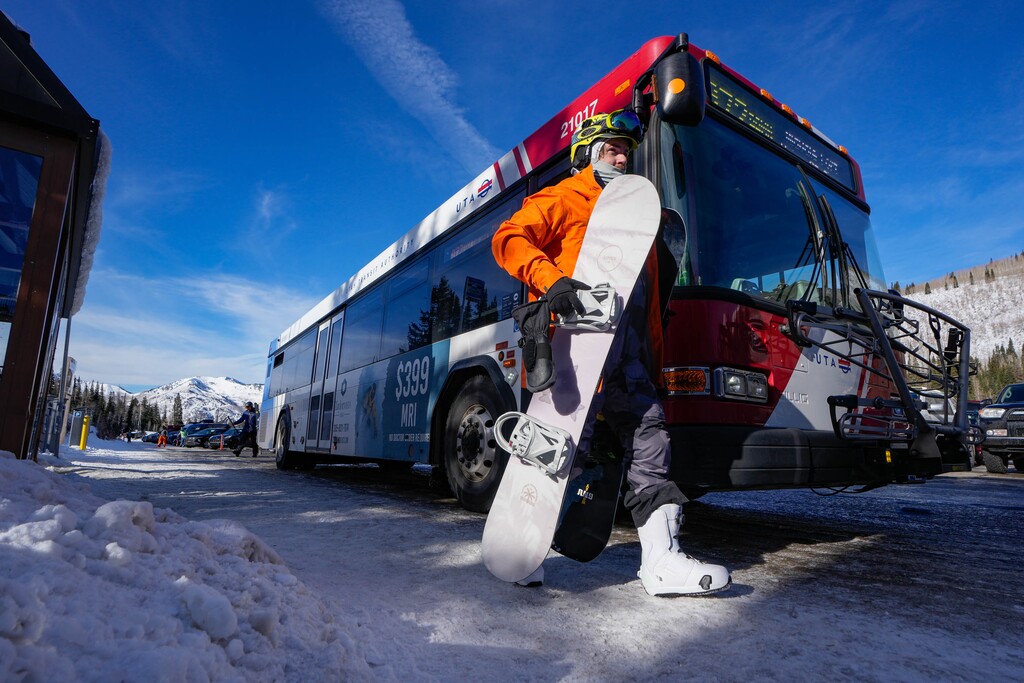 (Francisco Kjolseth  |  The Salt Lake Tribune) Ski buses stop at Solitude Mountain Resort on Wednesday, Dec. 6, 2023, during regular intervals to load and unload skiers and snowboarders. UTA's ski service will begin next week, contingent upon resort opening dates. 