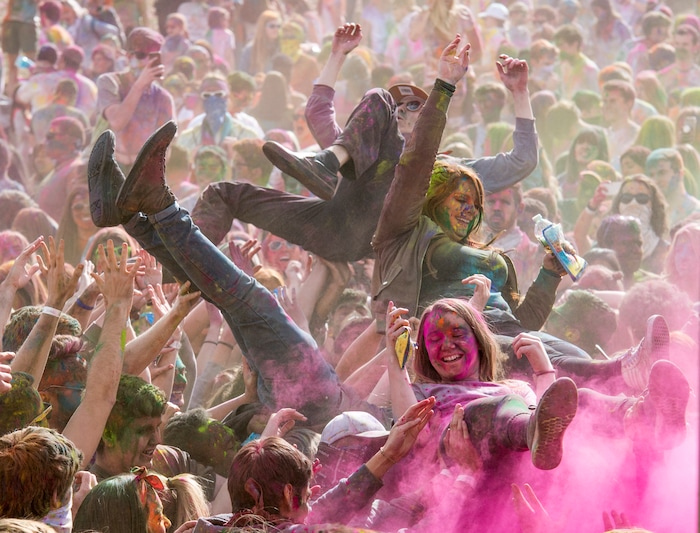 (Rick Egan  |  The Salt Lake Tribune)       Revelers body-surf, during the 22nd annual Holi Festival of Colors at the Sri Sri Radha Krishna Temple in Spanish Fork, Saturday, March 24, 2018. The festival which celebrates the beginning or spring is also known as at the Festival of Love.