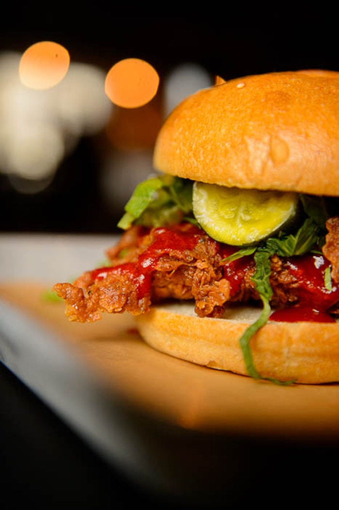 (Trent Nelson | The Salt Lake Tribune)  
Nomad Eatery, a new fast-casual restaurant near the airport in Salt Lake City. The chef/owner is Justin Soelberg, who worked at Avenues Proper and Proper Burger before launching this new eatery. Thursday March 22, 2018. Spicy chicken sandwich.