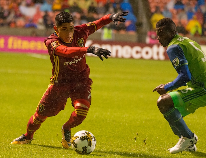 (Rick Egan  |  The Salt Lake Tribune) Real Salt Lake forward Jefferson Savarino (7) goes for the ball along with Seattle Sounders defender Nouhou Tolo (5), in MLS soccer action, Real Salt Lake vs Seattle Sounders, in Sandy, Saturday, September 23, 2017.