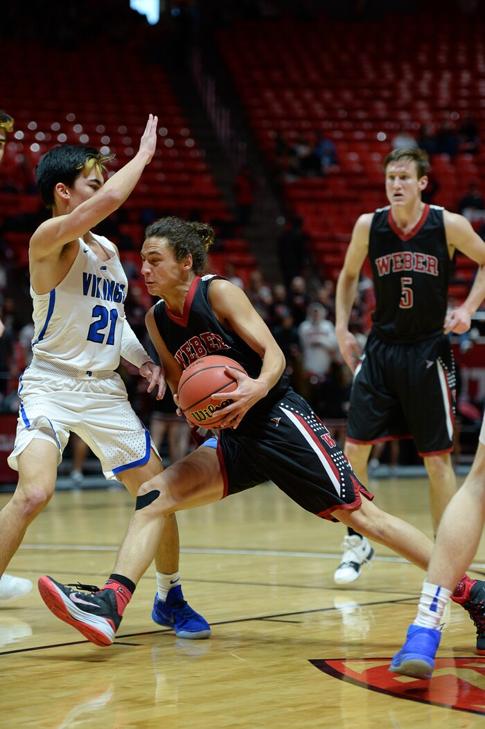 (Francisco Kjolseth  |  The Salt Lake Tribune)  Weber vs Pleasant Grove, 6A State high school basketball tournament at the Huntsman Center in Salt Lake City, Thursday March 1, 2018. Pleasant Grove's Kawika Akina (21) puts the brakes on Hudson Schenck (3). 
