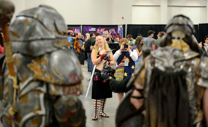 (Steve Griffin  |  The Salt Lake Tribune)  People stop to photograph costumed guests at the  2017 Salt Lake Comic Con at the Salt Palace Convention Center Friday September 22, 2017.