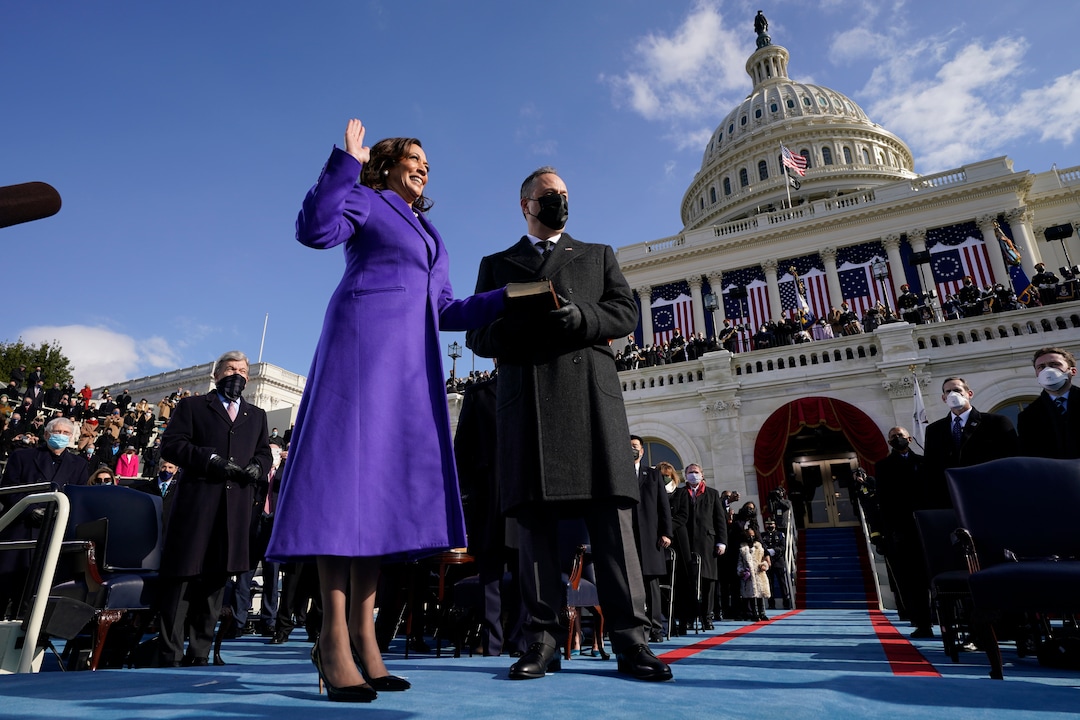 Kamala Harris is sworn in as Vice President by Supreme Court Justice Sonia Sotomayor as her husband Doug Emhoff holds the Bible during the 59th Presidential Inauguration at the U.S. Capitol in Washington, Wednesday, Jan. 20, 2021. (AP Photo/Andrew Harnik, Pool)