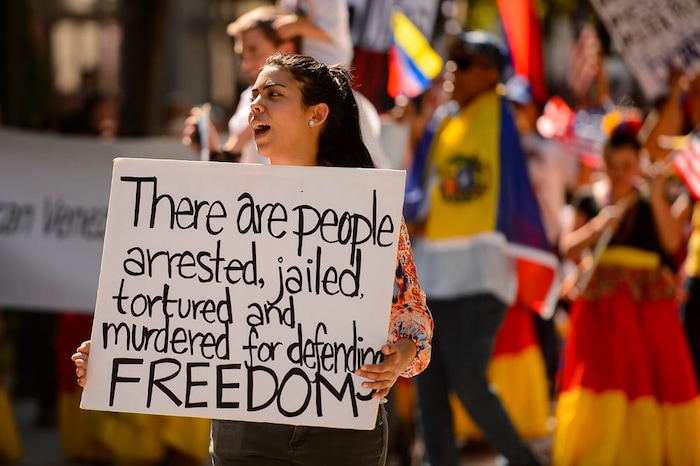 (Trent Nelson | The Salt Lake Tribune)
A group calling attention to the situation in Venezuela march in the third annual Hispanic Heritage Parade and Street Festival in Salt Lake City, Saturday Sept. 22, 2018.