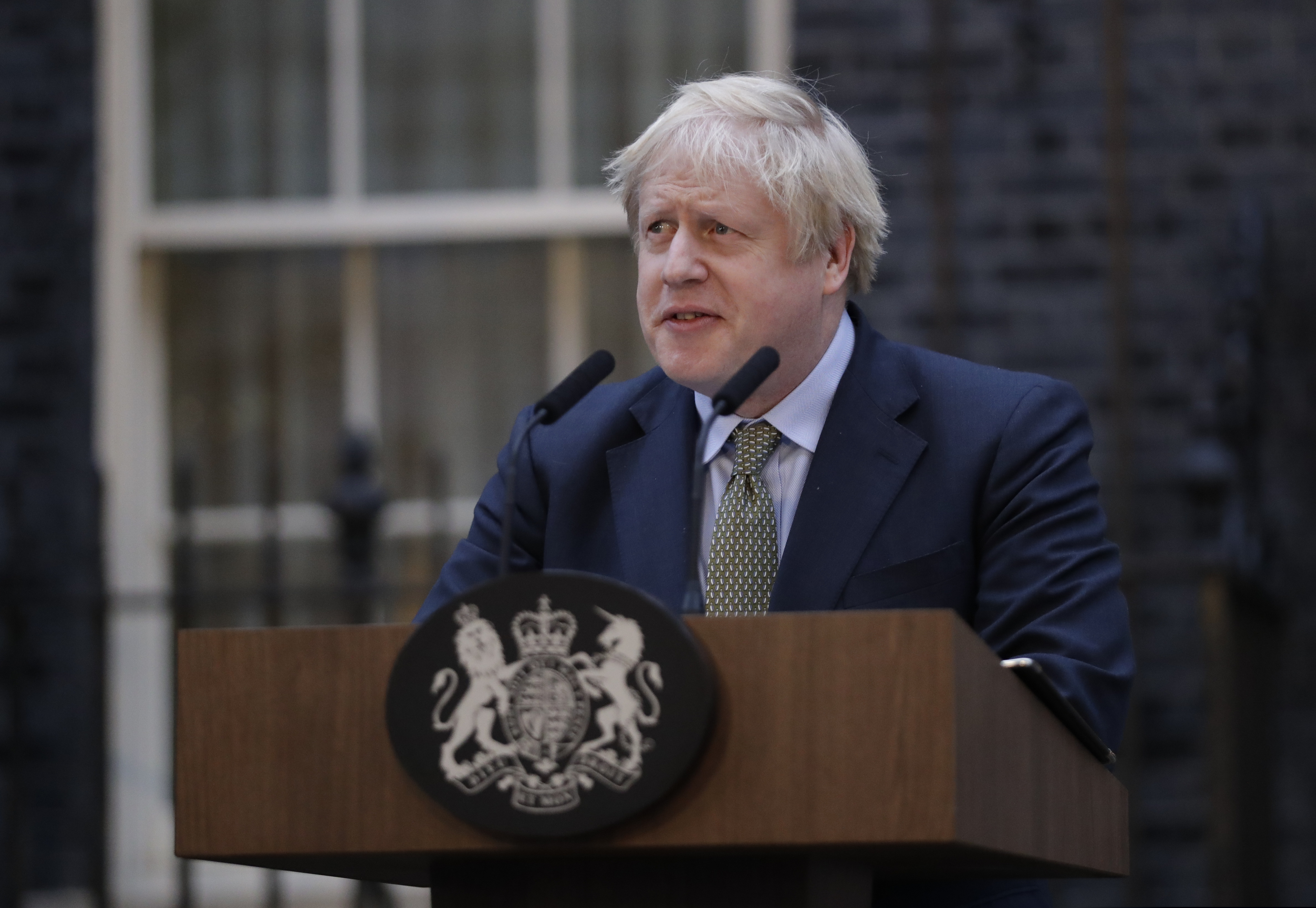(Matt Dunham | AP) Britain's Prime Minister Boris Johnson speaks outside 10 Downing Street in London on Friday, Dec. 13, 2019. Boris Johnson's gamble on early elections paid off as voters gave the UK prime minister a commanding majority to take the country out of the European Union by the end of January, a decisive result after more than three years of stalemate over Brexit.