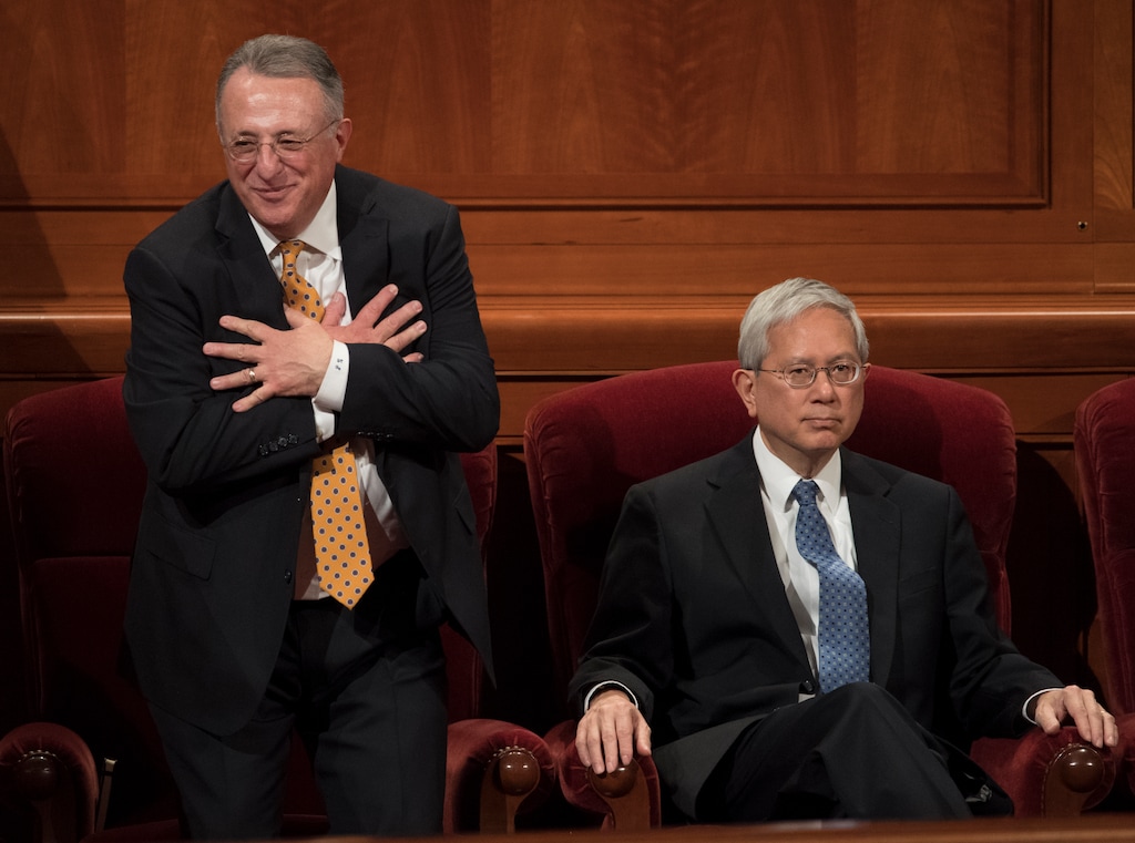 (Rick Egan  |  The Salt Lake Tribune)         Elder Ulisses Soares motions to someone in the audience, as he and Elder Gerrit W. Gong take their seats with the quorum of the Twelve before the Saturday afternoon session of the188th Annual General Conference in Salt Lake City, Saturday, March 31, 2018.