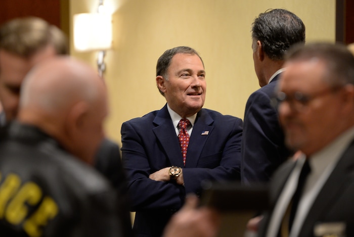 (Francisco Kjolseth  |  The Salt Lake Tribune)  Utah Gov. Gary Herbert speaks with Mitt Romney prior to his speaking engagement at the Utah Economic Outlook & Policy Summit 2018, hosted by the Salt Lake Chamber at the Salt Lake City Marriott Downtown at City Creek on Tuesday, Jan. 16, 2018. 