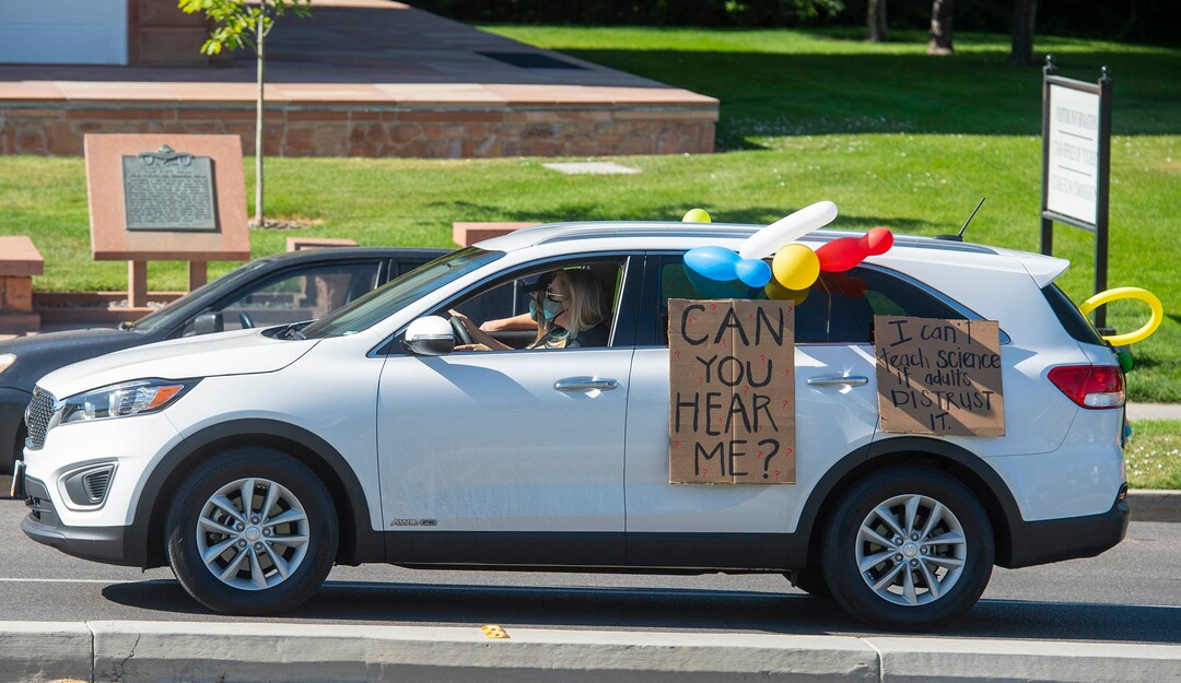 (Rick Egan  |  The Salt Lake Tribune)  A caravan of cars honks as they drive past the State Capitol, during a Mask-In and Car Caravan protest at the State Capitol to demand the governor and other state and local leaders ensure that Utah schools protect students and staff when schools reopen, on Thursday, July 23, 2020.