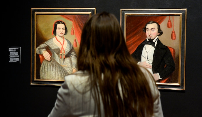 (Leah Hogsten  |  The Salt Lake Tribune) l-r Portrait of a Woman and Portrait of a Man, ca. 1840-1850, oil on canvas mounted to masonite by an Unidentified artist of the New Orleans school. The two portraits depict Ôa well-heeled couple in the antebellum South.Õ Utah Museum of Fine Art curator of European, American, and regional art Leslie Anderson conceived and planned the new exhibit: "Power Couples: The Pendant Format in Art," open now through December 8, 2019. ÒPower Couples explores how artists have used the pendant format across media, cultures and time periods to explore gender roles and social status; to present moments of before-and-after, cause-and-effect and departure-and-return; and to compare and contrast familiar stories and ideas.Ó -UMFA