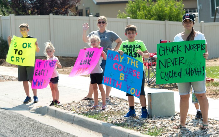 (Rick Egan  |  The Salt Lake Tribune)  Fans show up with signs to greet the cyclists in Layton, in the Tour of Utah Stage 5, Friday, August 4, 2017.


