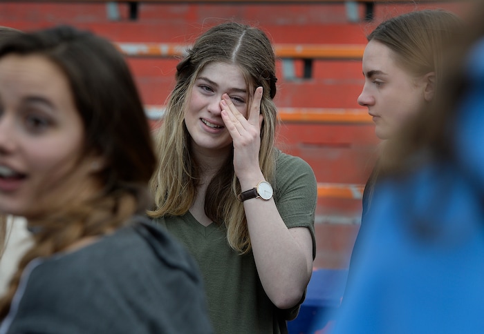 Scott Sommerdorf | The Salt Lake Tribune
Meghan Taylor wipes away some tears after she and other students observed a minute of silence for each of the 17 students and staff killed at Marjory Stoneman Douglas High School, during their walkout at Brighton High School, Wednesday, March 14, 2018.
