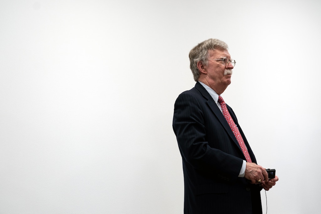 (Erin Schaff | The New York Times) John Bolton, then the White House national security adviser, looks on as President Donald Trump meets with Prime Minister Shinzo Abe of Japan and Prime Minister Narendra Modi at the G20 Summit in Osaka, Japan, on June 27, 2019. In an interview, Bolton says he accepted that he would pay a price for perhaps the most incriminating portrait of a president by such a high-level aide since the Watergate era.