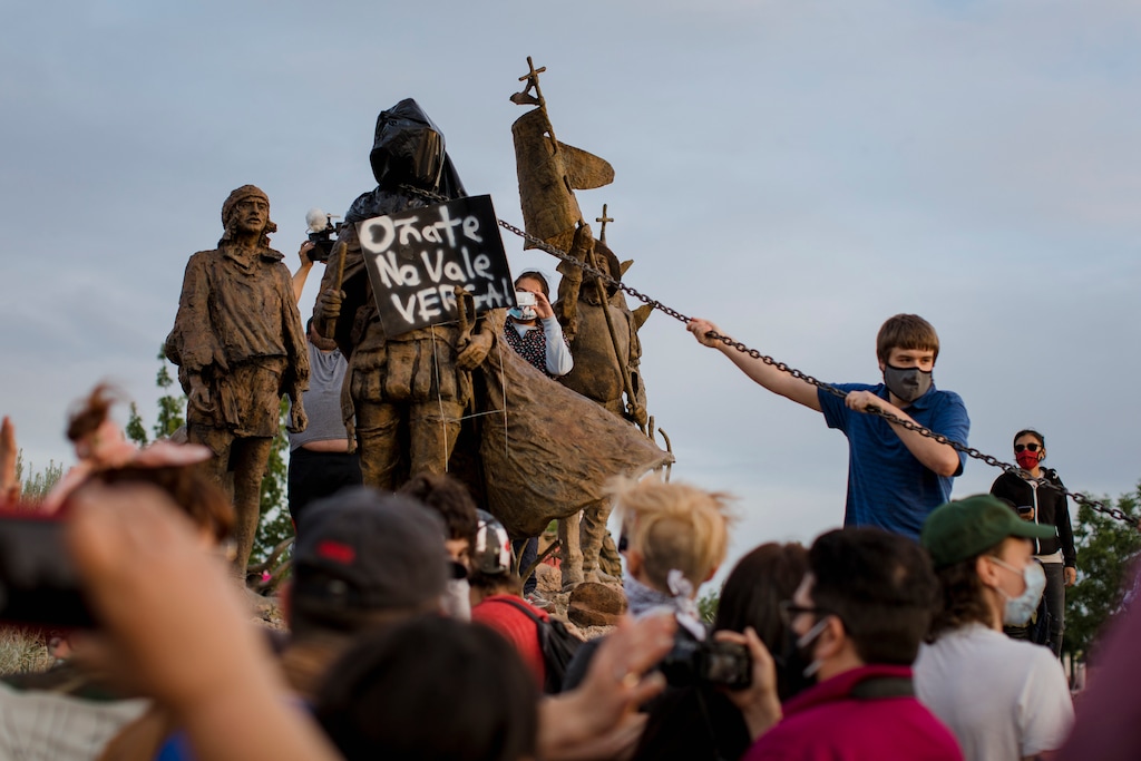 Protesters attempted to pull down a statue of Juan de Onate outside the Albuquerque Museum on June 15, 2020, in Albuquerque, N.M. The agitation against honoring Juan de Onate reflects a tension that has long festered between Native Americans and Hispanics over Spain’s conquest of New Mexico more than four centuries ago. (Adria Malcolm/The New York Times)
