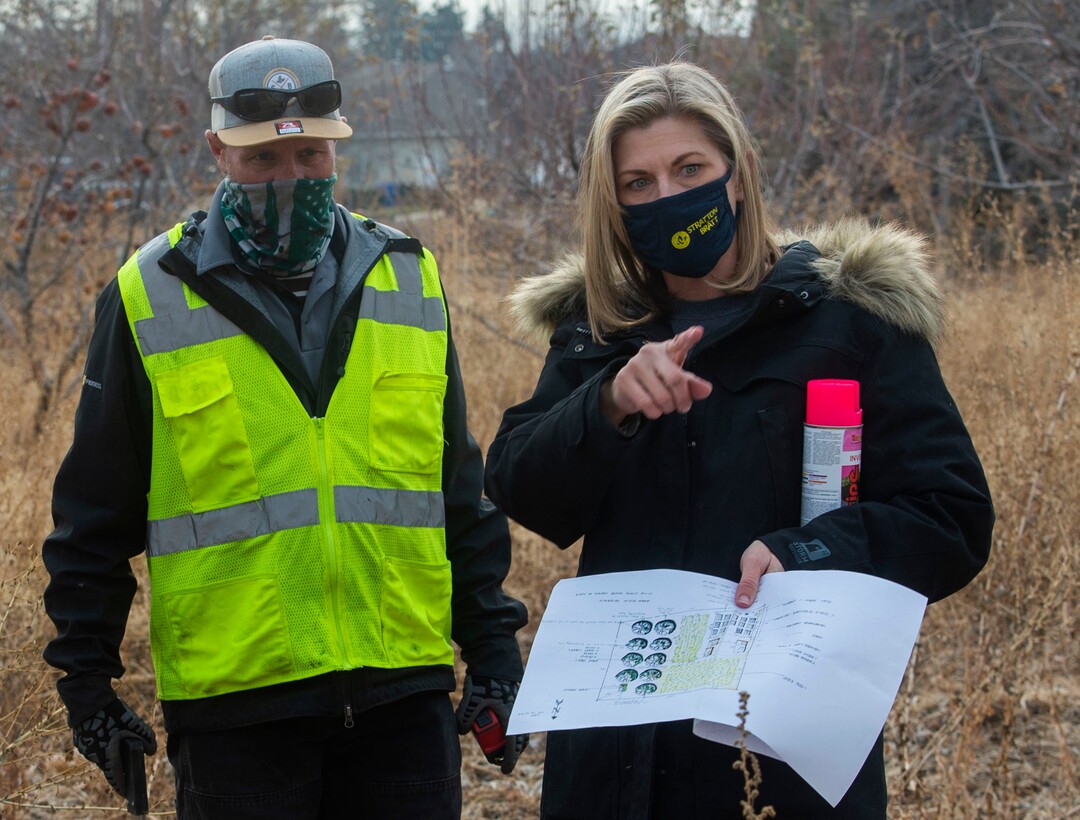 (Rick Egan | The Salt Lake Tribune)  Donna Showalter and Aaron Brinkerhoff, workers from Stratton and Brätt, help plan where the planter boxes will be placed, on the small farm owned by Jennie Taylor's family, Thursday, Dec. 10, 2020.