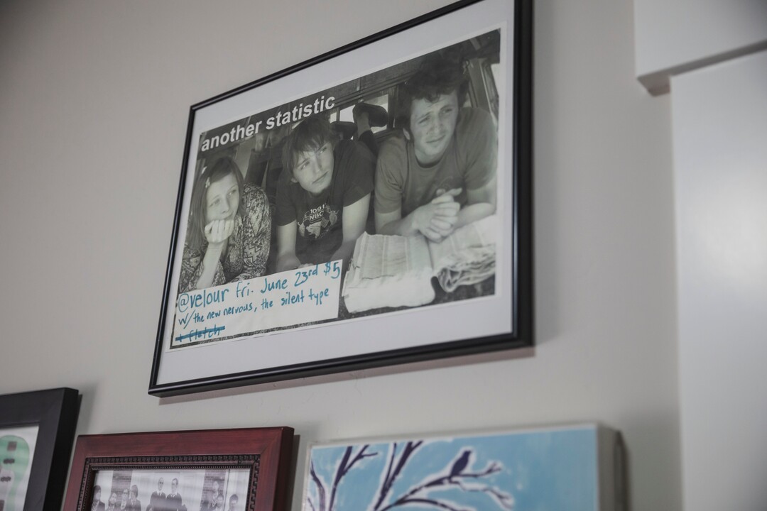(Clark Clifford  |  For The Salt Lake Tribune) An old show poster of Elaine Bradley, Chris Bennett and Bryce Taylor of Noble Bodies back when the band was known as Another Statistic, hangs in their rehearsal space in Orem on Saturday, Aug. 3, 2019.