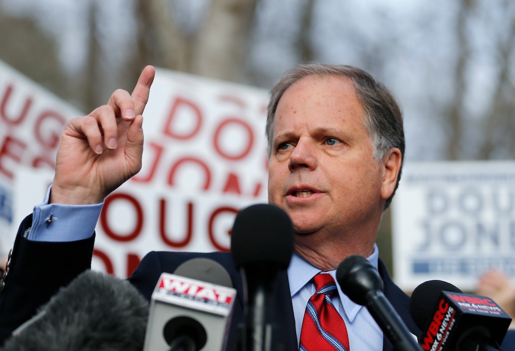 Democratic candidate for U.S. Senate Doug Jones speaks to reporters after casting his ballot Tuesday, Dec. 12, 2017, in Mountain Brook , Ala.  Jones is facing Republican Roy Moore. (AP Photo/John Bazemore)